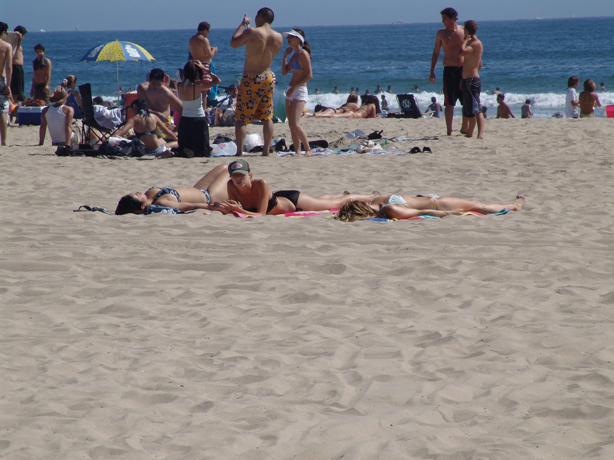 lay in the sun and soak it up on the balboa peninsula beach sand 